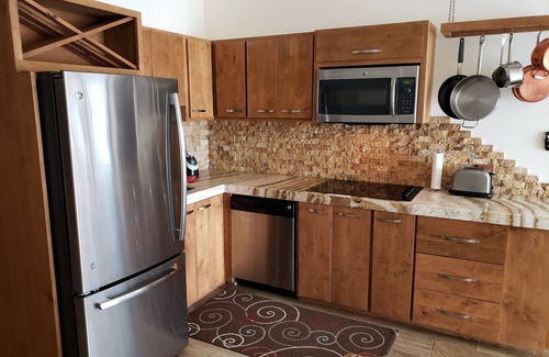 Los Cabos Condo | Beautifully updated apartment-like condo with roof top pool! (24/7 security)