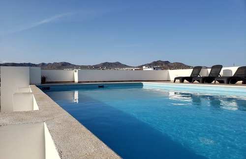 Los Cabos Condo | Beautifully updated apartment-like condo with roof top pool! (24/7 security)