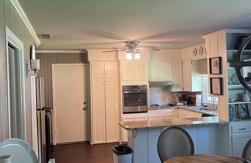 Tyler House | Beautifully updated 3bedroom 2 bath home with a large glassed in sunroom.