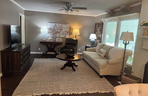 Tyler House | Beautifully updated 3bedroom 2 bath home with a large glassed in sunroom.