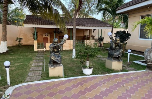 Teshie House | Bedroom 1 in Tropical Accra House