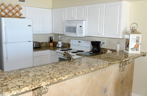Fort Walton Beach Condo | Bedroom & Living room Gulf Front! FREE beach chairs & covered parking