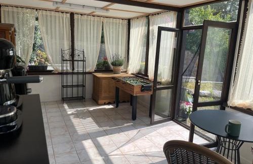 Yvoir Apartment | Bedroom with extension on Veranda