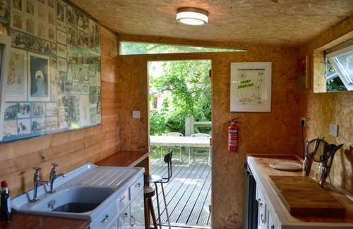 Runham RV Rental | Bell Tent and Chrome Fairground Caravan