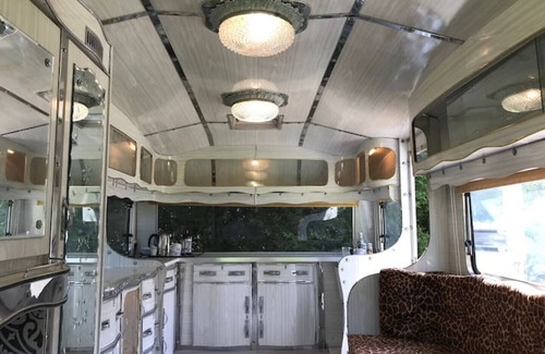 Runham RV Rental | Bell Tent and Chrome Fairground Caravan