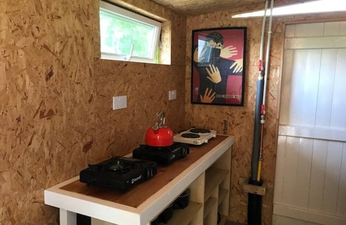 Runham RV Rental | Bell Tent and Chrome Fairground Caravan