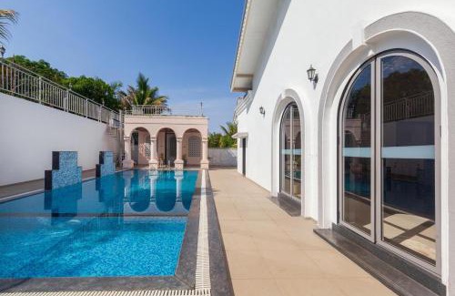 Nashik Villa | Bellevue Palace by StayVista - Lavish abode with a pool, Landscaped lawn, Gazebo & Adventure activities