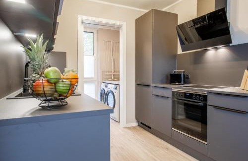 Marienleuchte Apartment | BeltBlick 20 - Moderne Ferienwohnung direkt an der Ostsee mit Meerblick & Sauna!