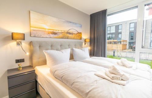 Marienleuchte Apartment | BeltBlick 20 - Moderne Ferienwohnung direkt an der Ostsee mit Meerblick & Sauna!