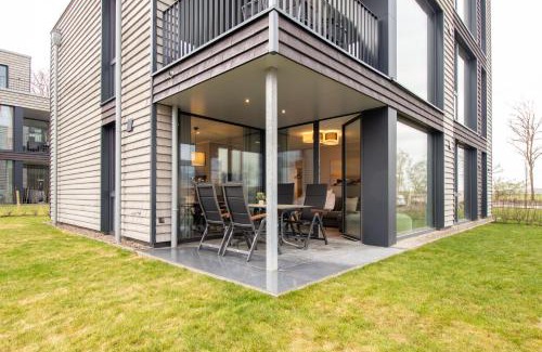Marienleuchte Apartment | BeltBlick 20 - Moderne Ferienwohnung direkt an der Ostsee mit Meerblick & Sauna!