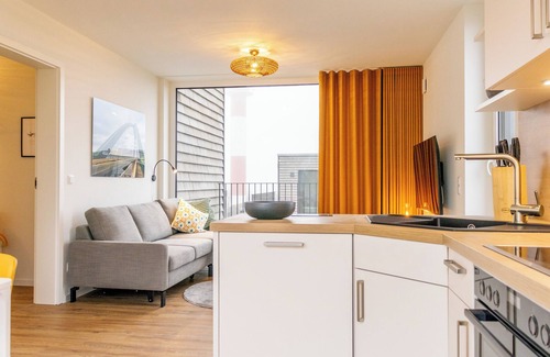 Marienleuchte Apartment | BeltBlick 30 - roof terrace. Sauna. Sea view. Family-friendly.