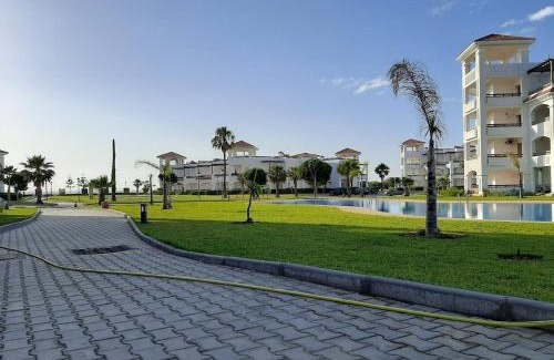 Asilah Beach Apartment | BERALMAR RESIDENCE Privée en terrasse rez-de-jardin pied dans l'eau Chez FAOUZIA
