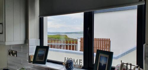 Liscannor House | Beside the sea & minutes from Cliffs-Clahane Shore Lodge