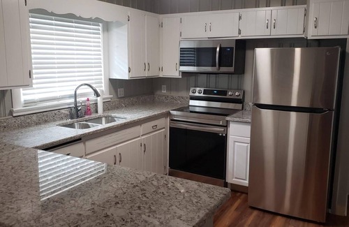 Wilmington House | Beside UNCW- 4-bedroom, 2 full bath house- minutes from Wrightsville Beach!