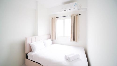 Surabaya Apartment | Best Choice 2BR at Puncak Dharmahusada Apartment Surabaya By Travelio