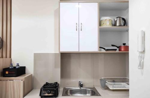 Panakkukang Apartment | Best Deal and Comfy 2BR Vida View Apartment By Travelio