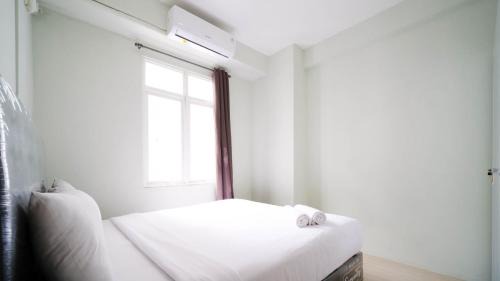 Surabaya Apartment | Best Location and Comfy 2BR at Bale Hinggil Apartment By Travelio