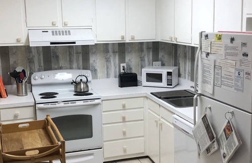 West Beach Cottage | Best location on the island! Lagoon view. Nice dogs stay free!
