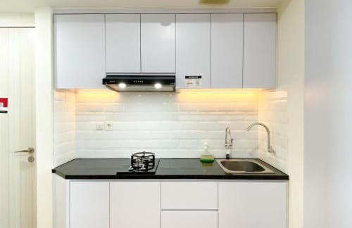Pekayon Jaya Apartment | Best Modern Studio at Grand Kamala Lagoon Apartment By Travelio
