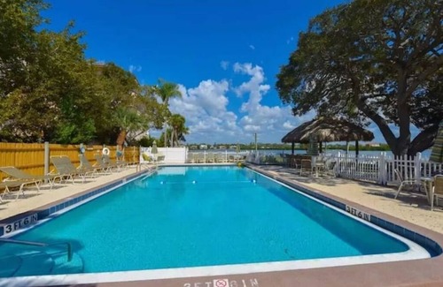 Siesta Key Condo | BEST OF BOTH WORLDS! Fish in the bay or walk across the street to the beach!