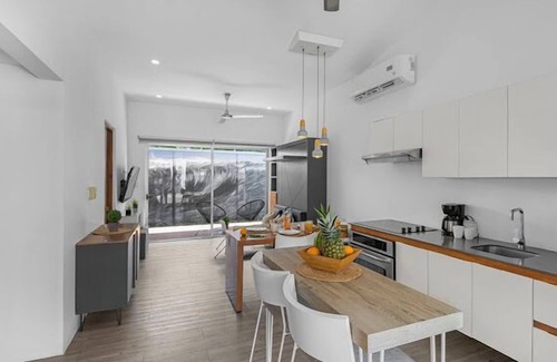 Barrio Ricos y Famosos Condo | Best vacation rental to enjoy. Close to Beach and Town. Fully equipped Condo.