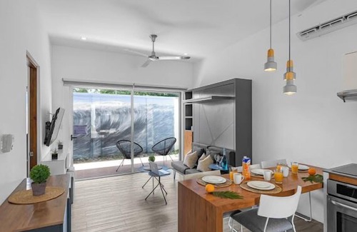 Barrio Ricos y Famosos Condo | Best vacation rental to enjoy. Close to Beach and Town. Fully equipped Condo.
