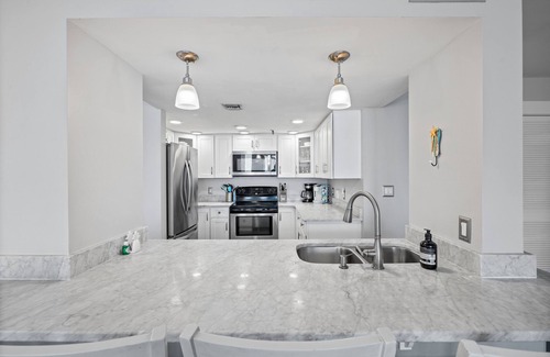 Holiday Isle Condo | BEST VIEWS IN DESTIN! WATERFRONT, 4 BDR, BEACH, POOL, HOT TUB, BOAT SLIP