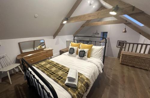 Carmarthen House | Beudy at Pentrecelyn - a gorgeous barn conversion with hot tub