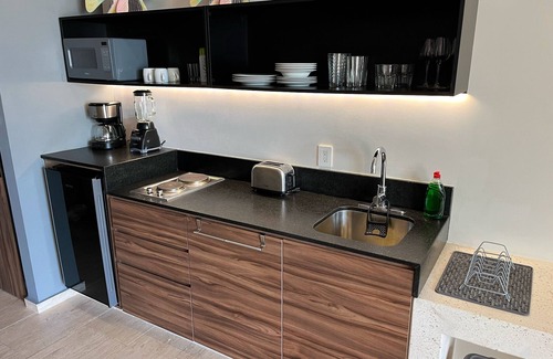 Centro Condo | Big Beautiful Studio Apartment - Rooftop Pool Ocean View