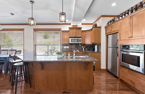 Big White Ski Resort Ski Chalet | Big White Ski In Ski Out Condo with brand new hot tub!