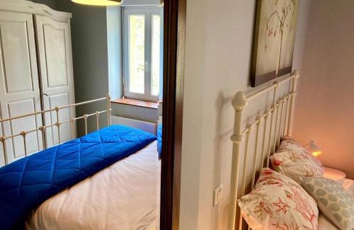 Lastours Apartment | Bijou SURDESPINE air conditioned 100m to Historic 4 Cathar Châteaux Lastours access to a very pretty riverside garden!