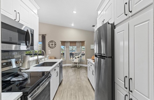 Indian Rocks Beach House | Bikini BeachHouse! Sleeps 16 w/Heated Pool+Firepit