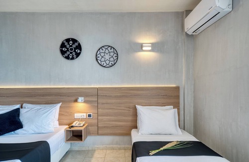 Kato Diminio Hotel | Black and White Boho Resort