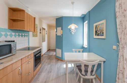 Muritz Apartment | Blaue Kombüse Altstadt Ferienwohnung im Fischerhaus