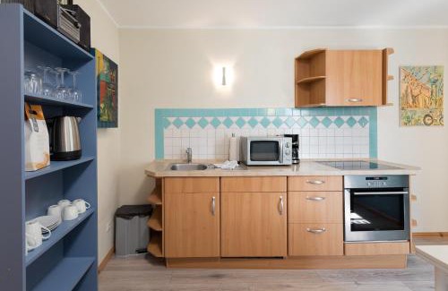 Muritz Apartment | Blaue Kombüse Altstadt Ferienwohnung im Fischerhaus
