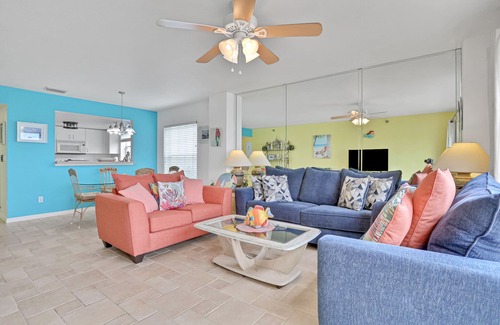 Independence Square Condo | Blissful condo with pool - Gulf-view balcony, private W/D & central AC