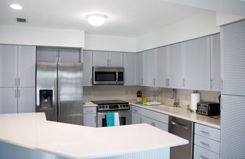 The Cove House | Blissful, serene waterfront Deerfield Beach retreat. Close to the beach.