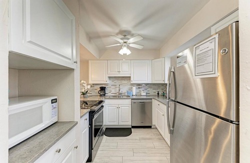 Bradenton Beach House | Blissfull Bay: Runaway Bay - Bayfront Condo! Largest Heated Pool by Anna Maria Life Vacation Rentals