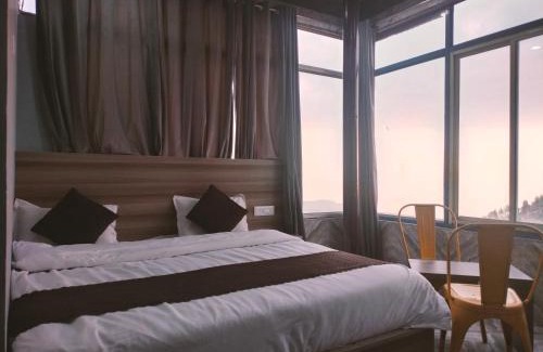 Kempty Range Hotel | Blossom Dhanaulti