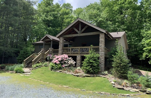 Blowing Rock House | Blowing Rock Retreat near Julian Price Park with stream and pond.