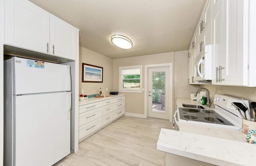 Holmes Beach House | Blue Bayou: Dog Friendly Home - 5 Houses to Beach by Anna Maria Life Vacation Rentals