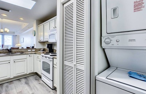 Florida Central Atlantic Coast Condo | Blue Heron Escape accommodates 8 and on the Lake