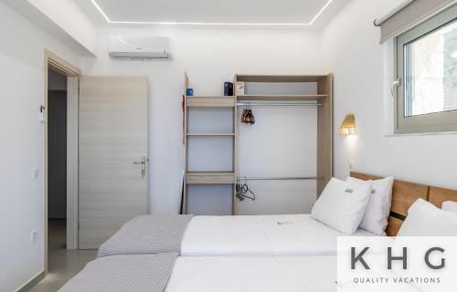 Mousata Villa | Blue pearl Villa with Private Pool in Afrato Village! Infinite sea views!