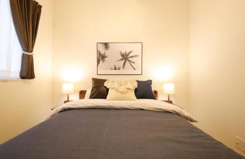 Ojima Island Apartment | blue sea and house