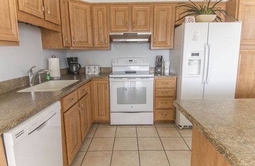 Surfcrest Village Condo | Bluefish 16 | Pet-Friendly Beach House with Balcony, Deck, Beach + Pool Access