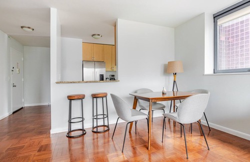 Central New York City Apartment | Blueground | Theater District, gym & AC, nr Times Sq