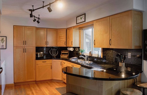 Berrien Springs House | Bluffview on the River with a hot tub, sauna, pool table, and more!