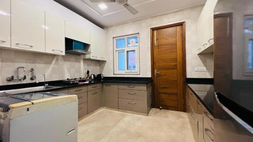 New Delhi Apartment | BluO 2BHK City Centre - Balcony, Lift, Terrace