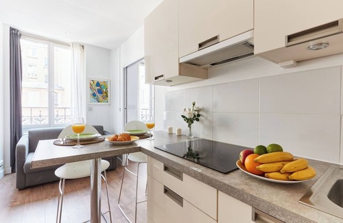 Quartier Sainte-Marguerite Apartment | BnBNook - Bright 1BR Near Place de la Bastille