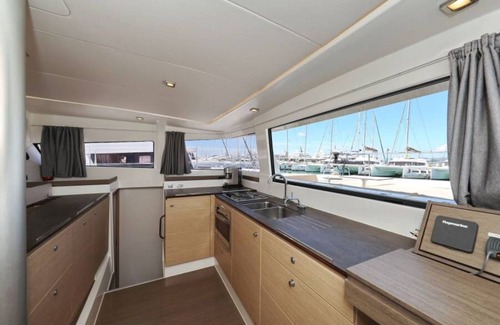 Portisco Boat Rental | Boat 'Catamarano 43 Foil E Kite Equipment' with Sea View, Wi-Fi and Air Conditioning
